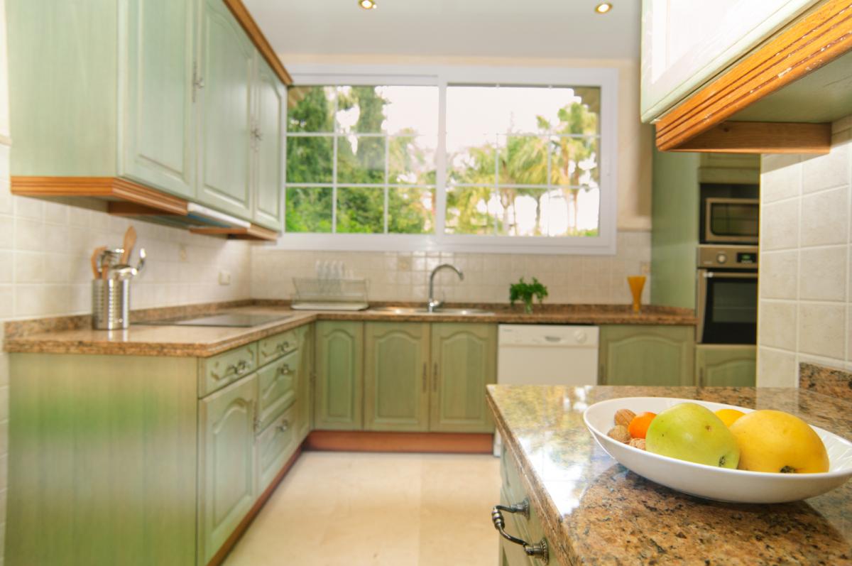 Kitchen opening to dining room